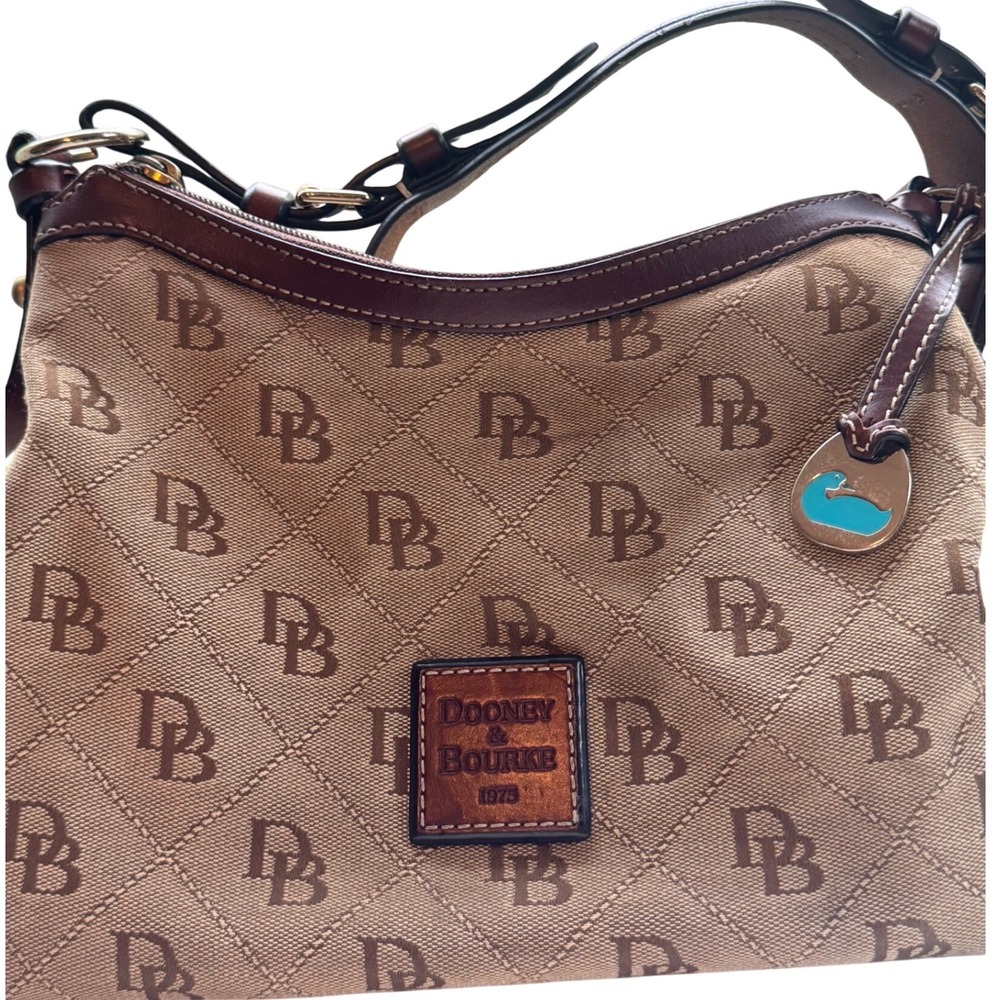 Dooney & Bourke Tan Brown Monogram Tote Bag Blue Duck Charm Bag Leather Trim - Picture 1 of 11